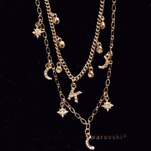 WHBM K initial necklace with celestial charms.